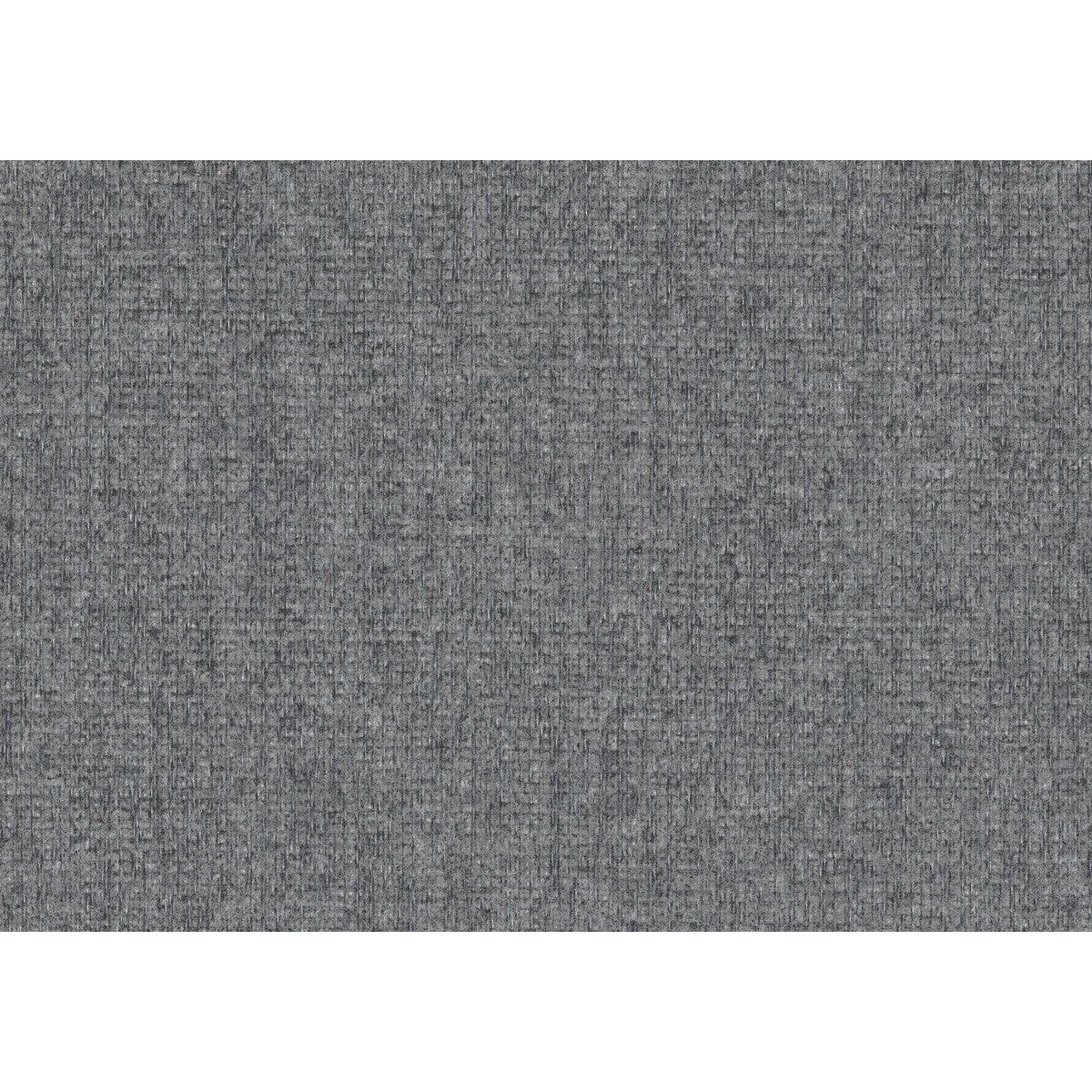 Swatch of gray chenille fabric upholstery on sectional sofa
