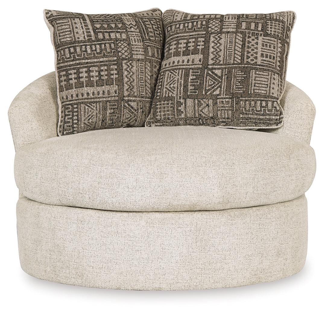 Head-on view of Soletren Stone Chenille Swivel Accent Chair featuring geometric throw pillows