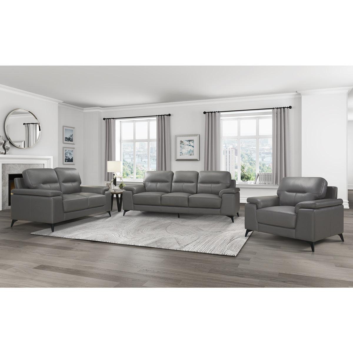 Seating close-up of Mischa dark gray leather and faux leather chair