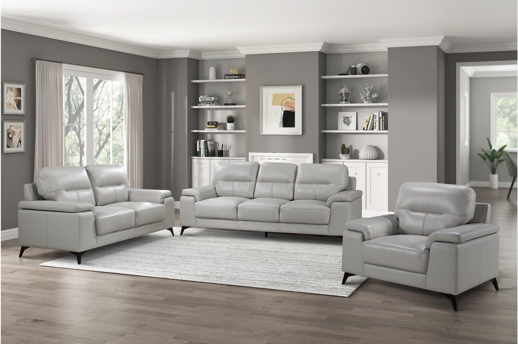 side view of Mischa Silver burgundy leather sofa and loveseat