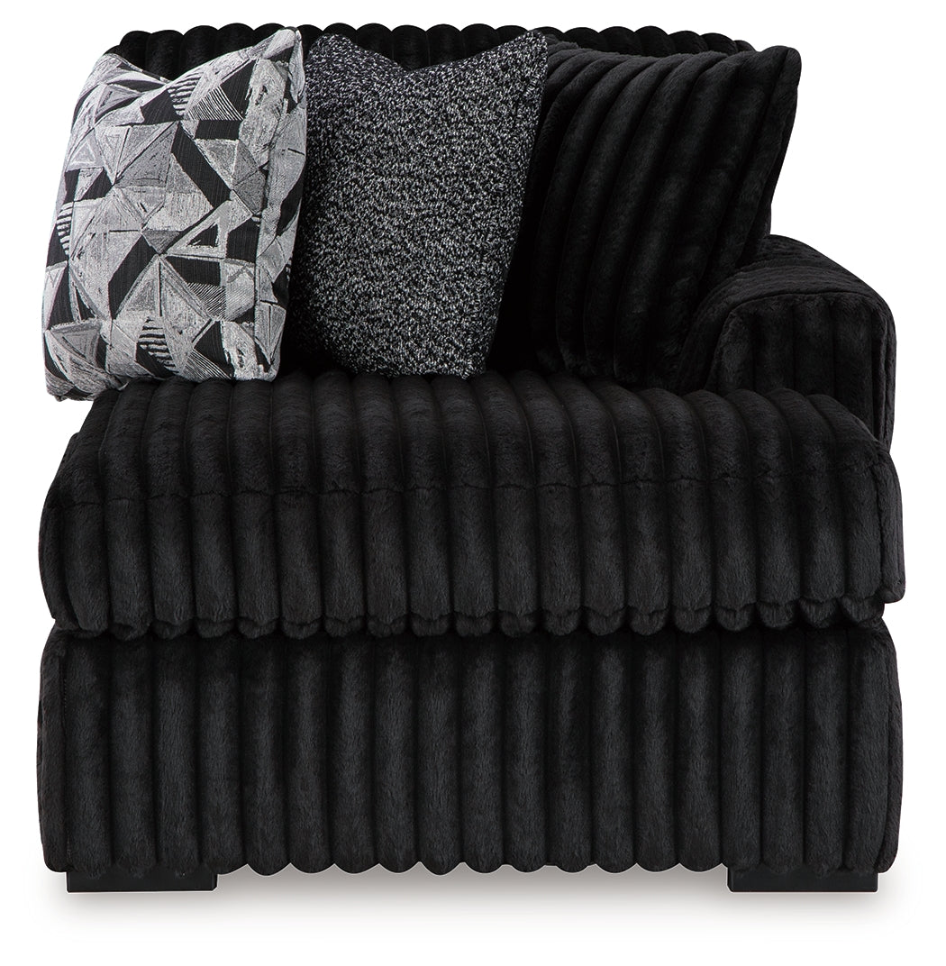 Side view of Midnight-Madness Onyx Velvet 3-Piece Sectional Sofa with Chaise