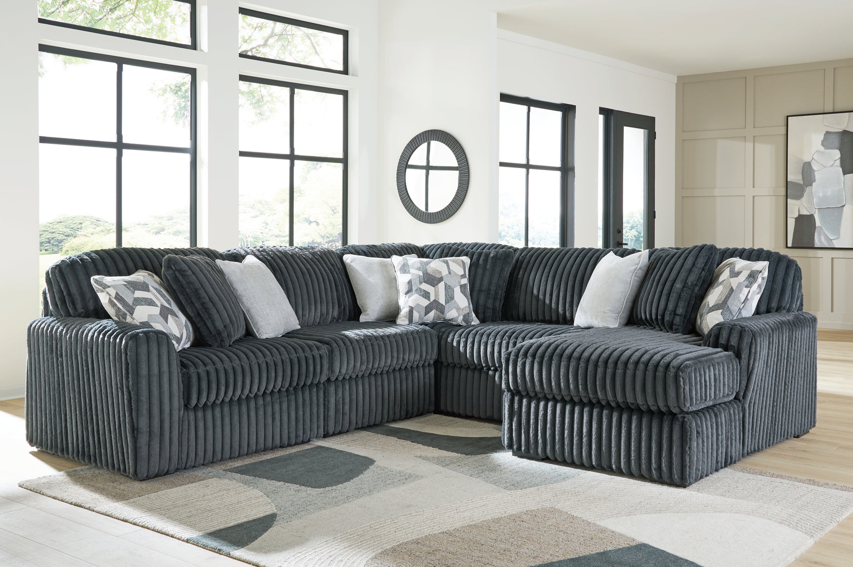 Room setting featuring Midnight-Madness 5-Piece Sectional with chaise