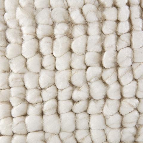 Fabric swatch of Aavie Ivory pillow face material