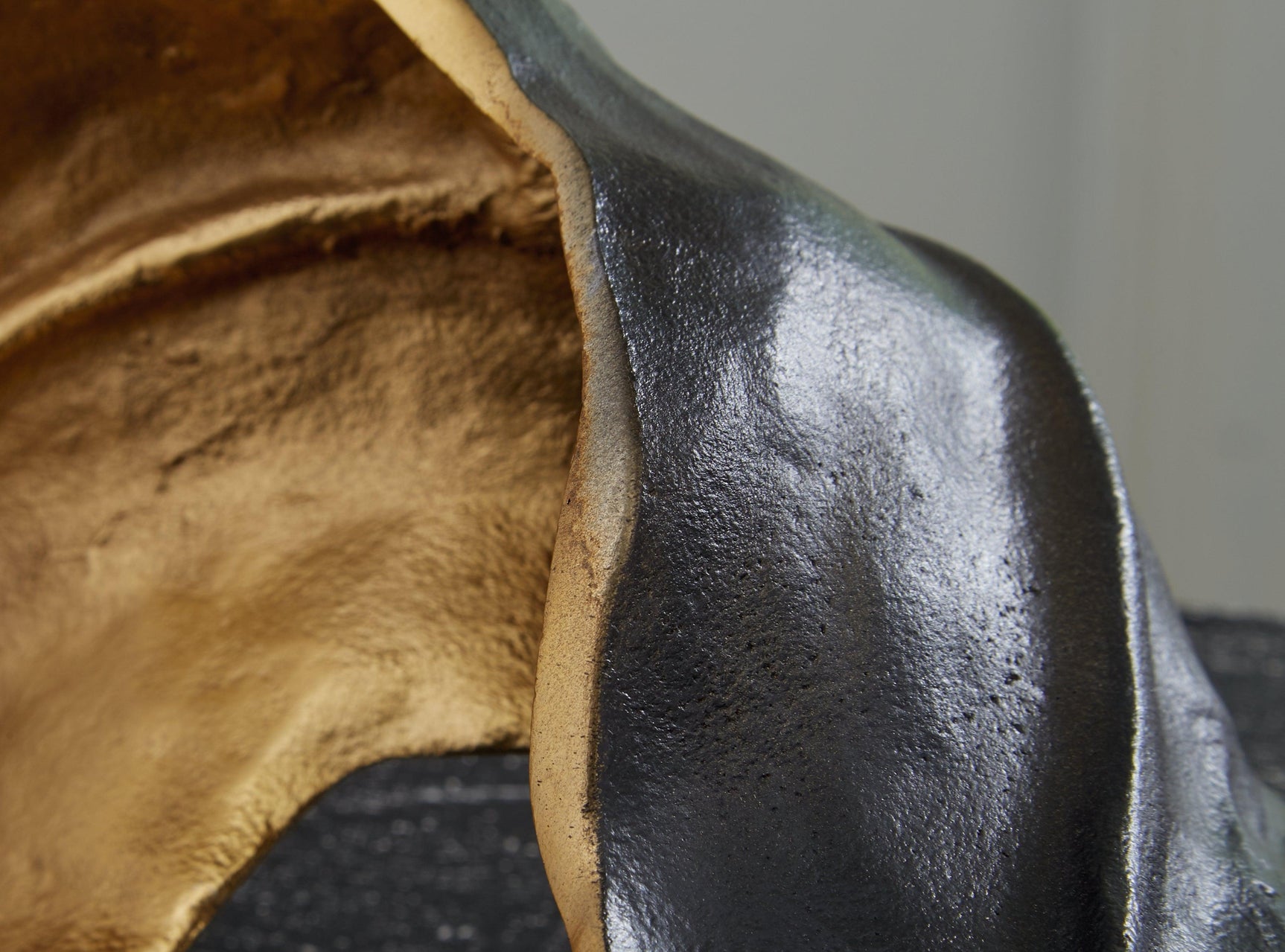 Melinda Sculpture side angle highlighting metal craftsmanship