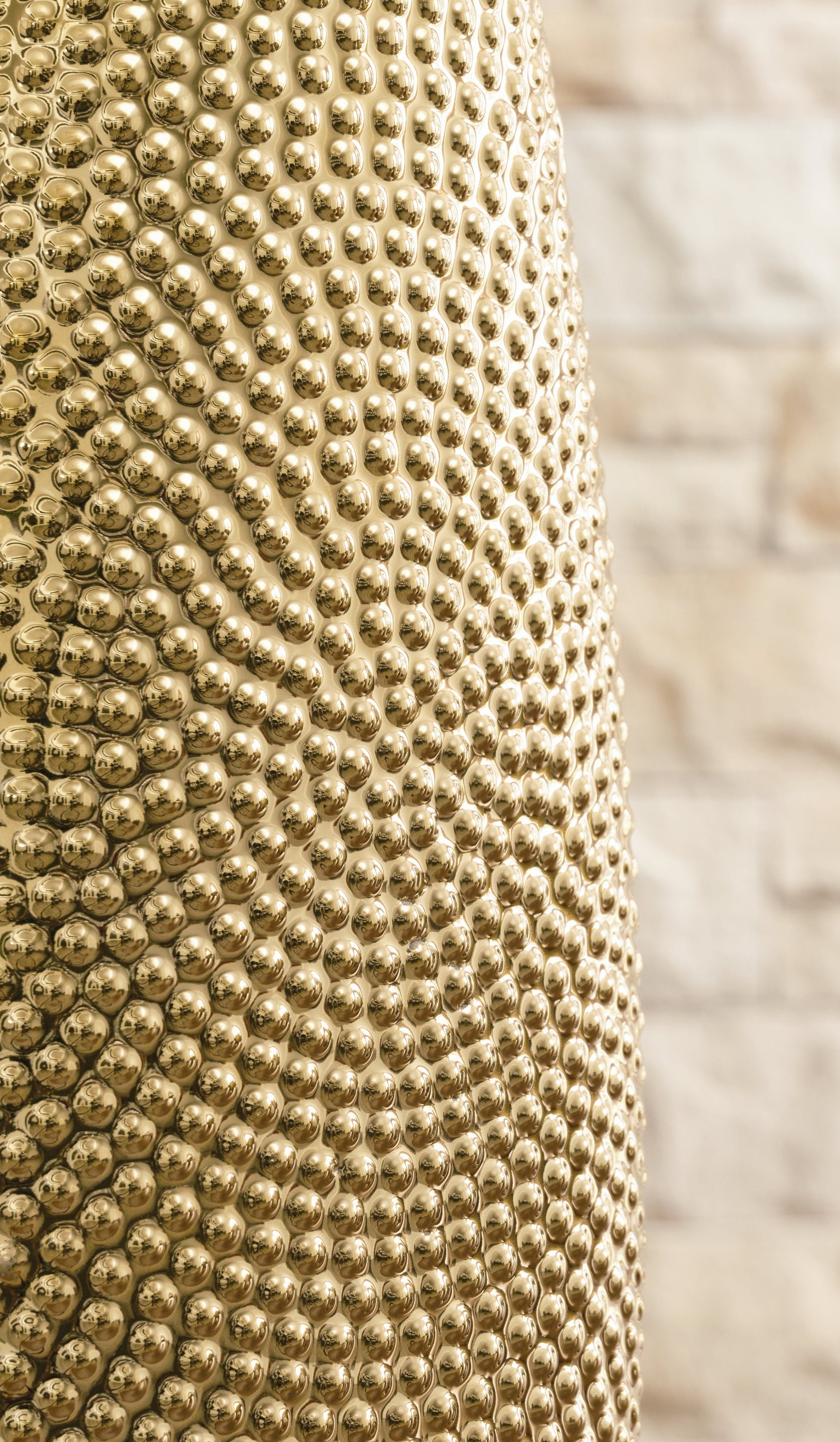 Efim gold finish ceramic vase detailed texture close-up