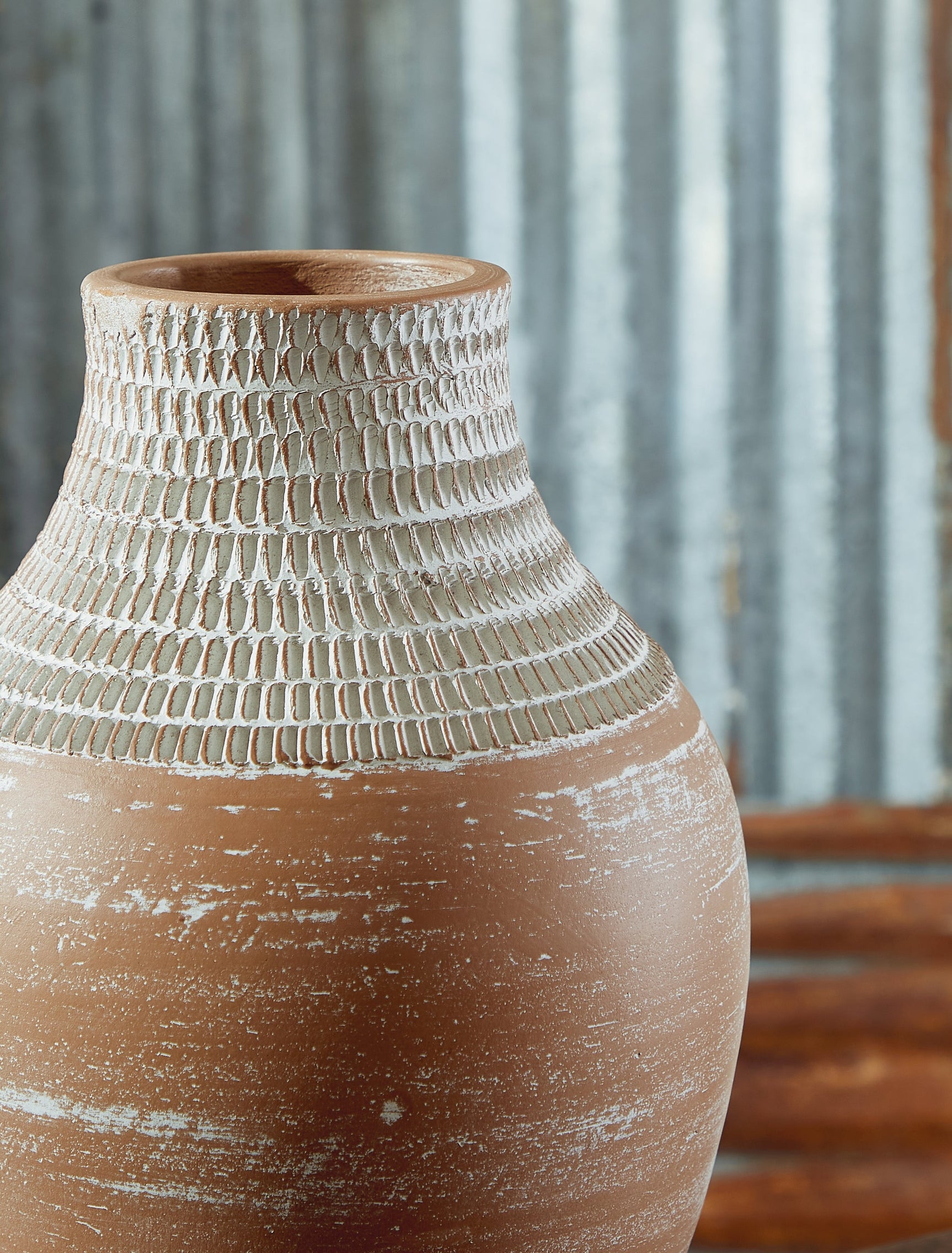 Close-up of distressed white finish on Reclove vase