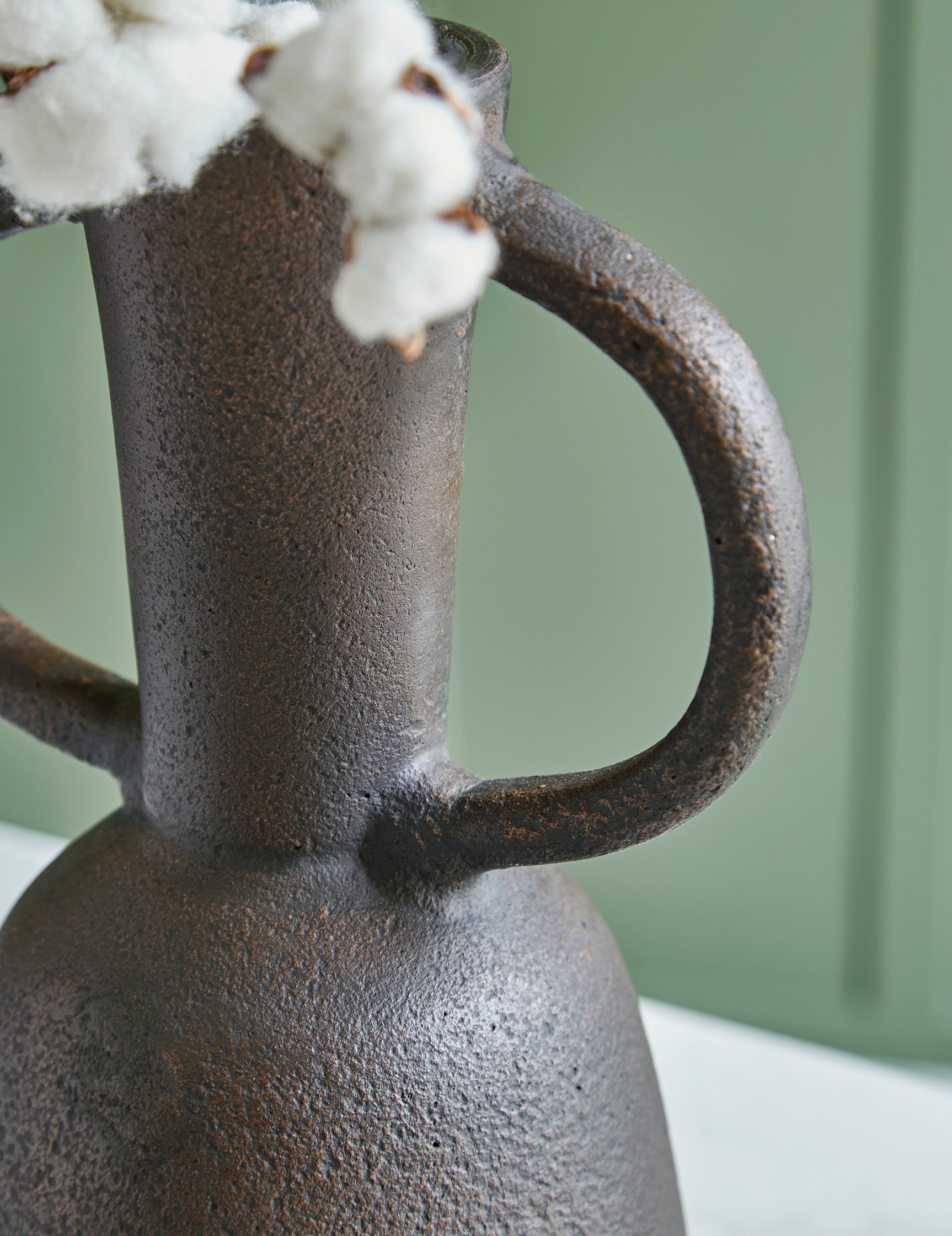 Aadeen vase side view highlighting large handles and texture