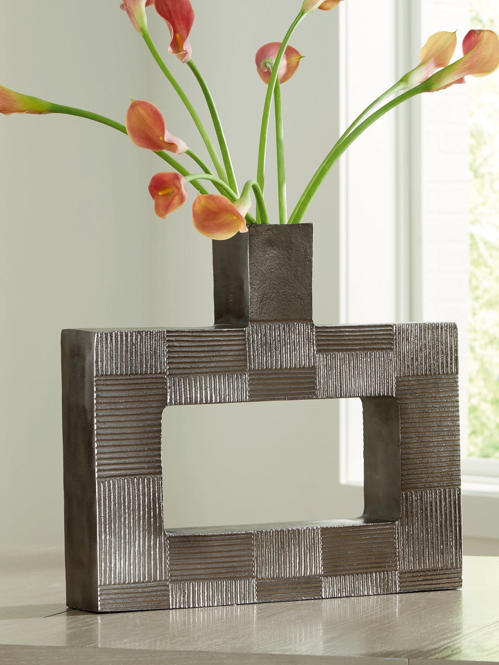Wrengrove vase displaying height and slender shape