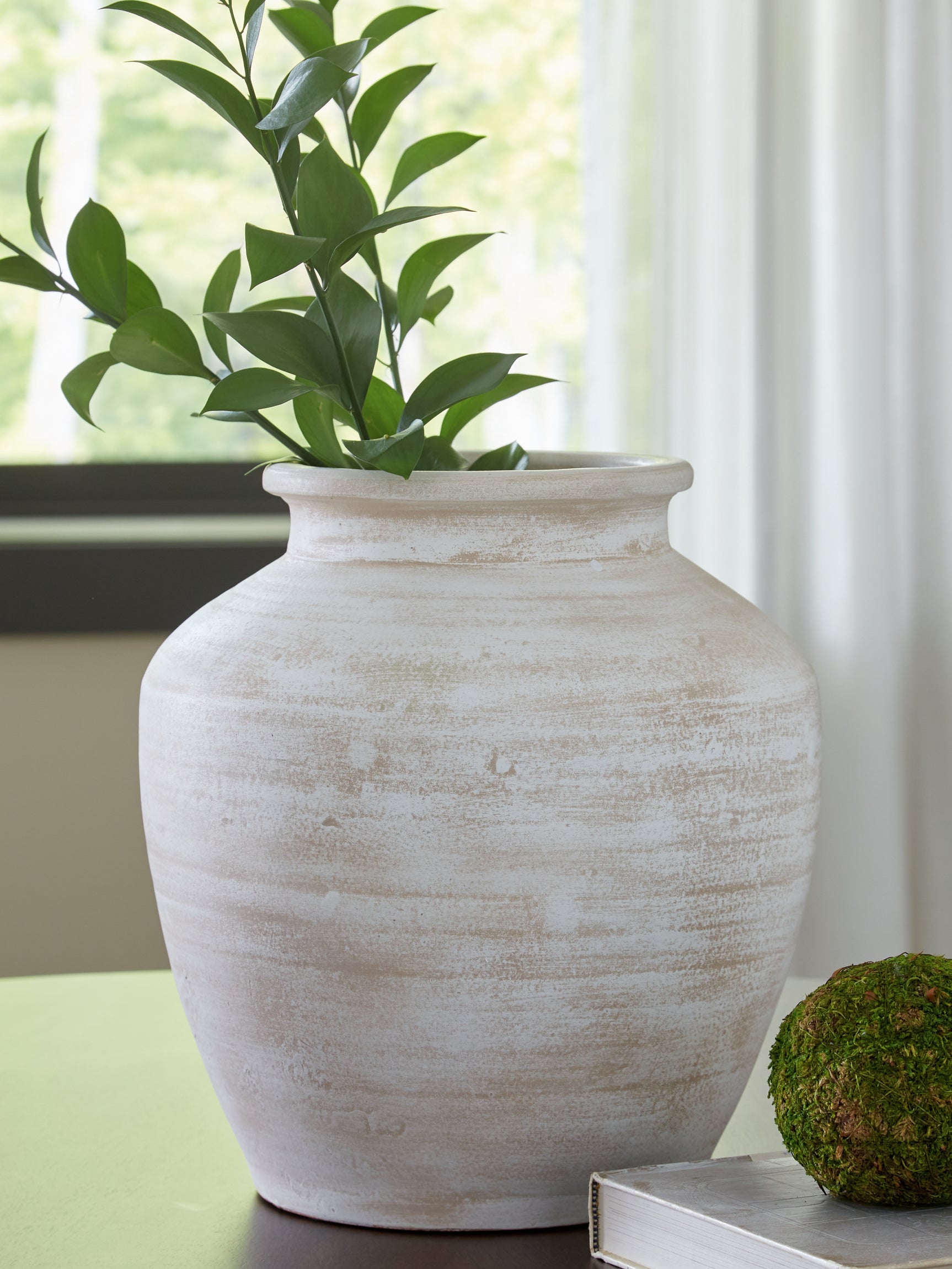 Meadie collection display showing multiple vases