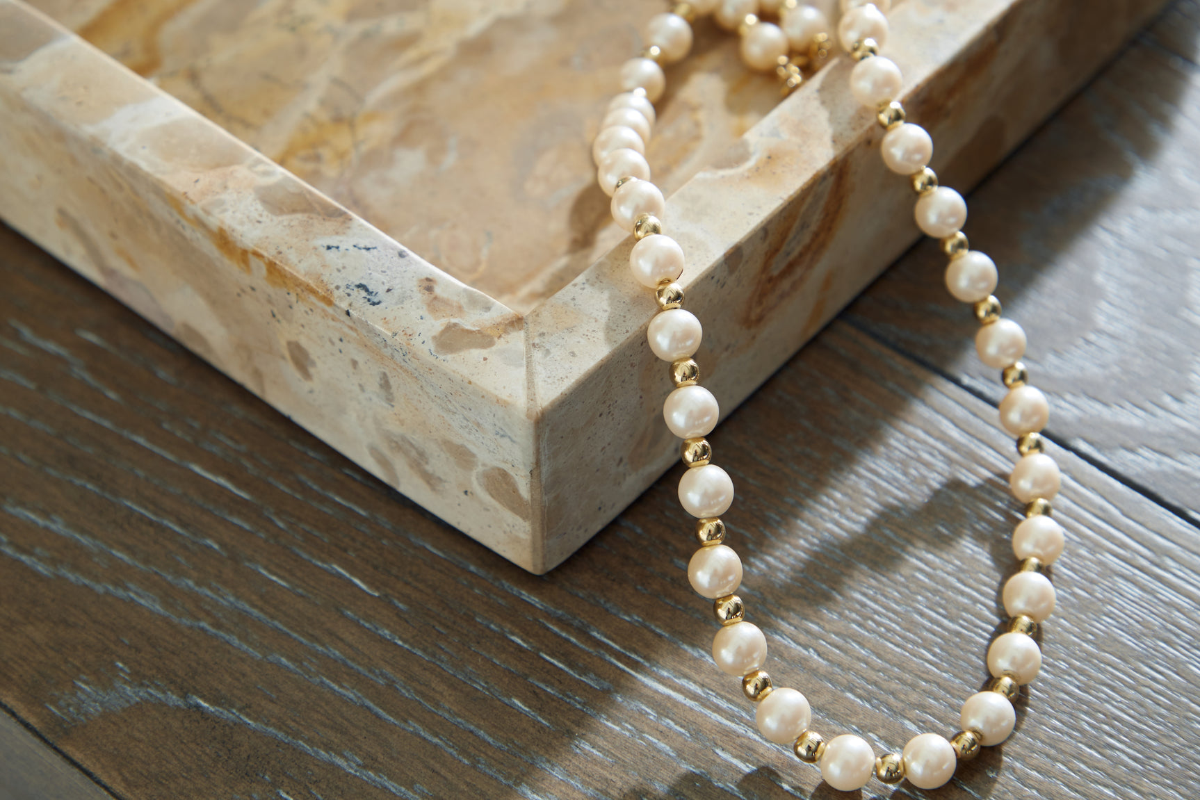 Light beige marble tray surface detail
