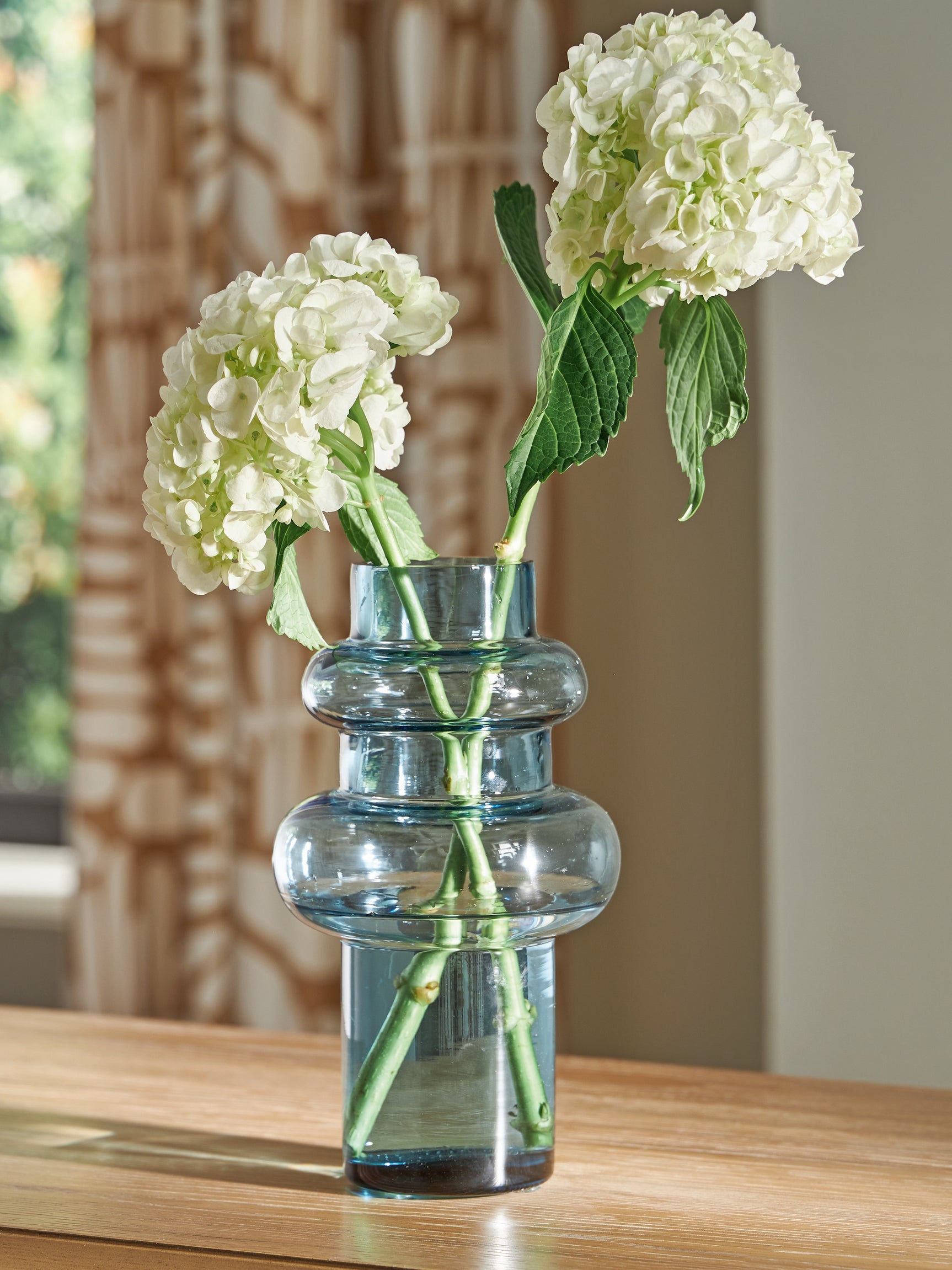 Vallmen Vase displayed with faux greenery
