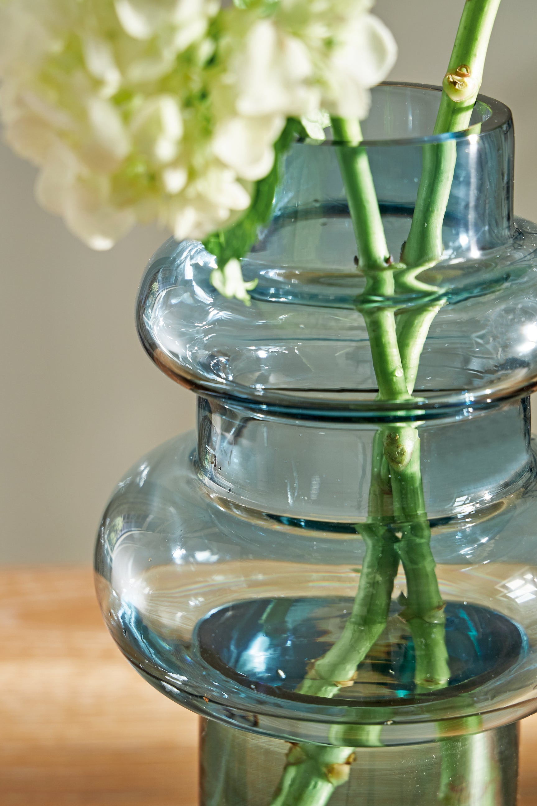 Vallmen Vase placed on wooden table