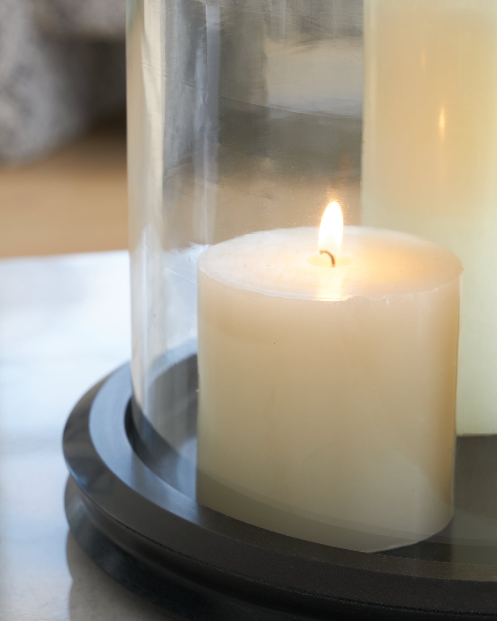 Close-up detail of black marble base on Saskia candle holder