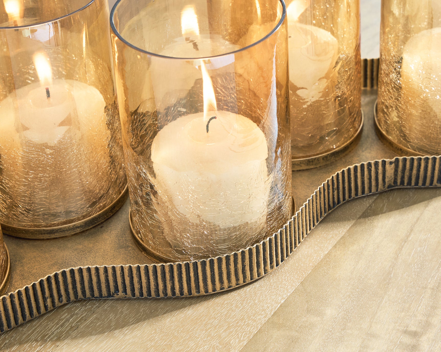 Evereton candle holder on table displaying five candle slots