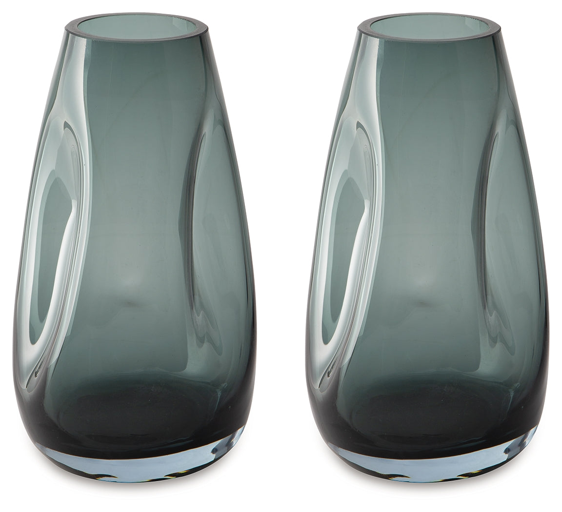 Close-up of teal glass vase detail