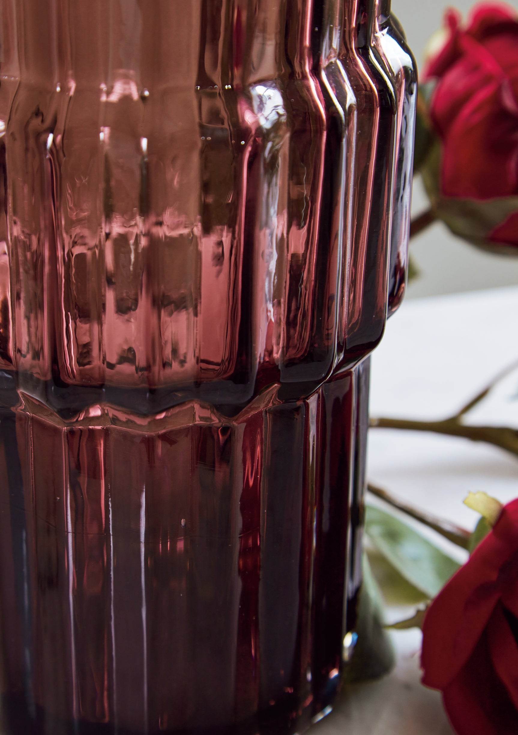 Close-up of mauve glass vase texture