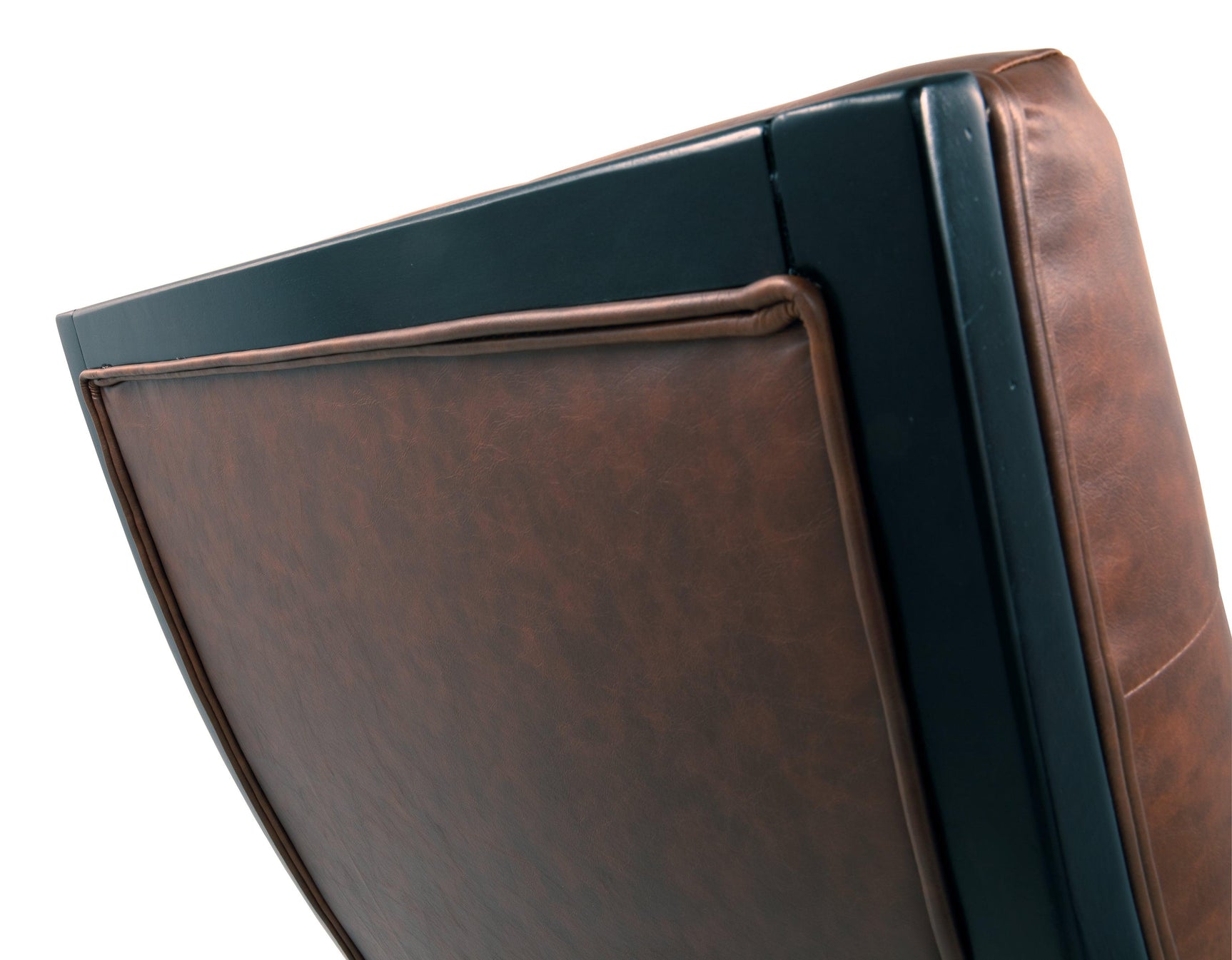 Close-up of faux leather upholstery on Sidewinder Chair