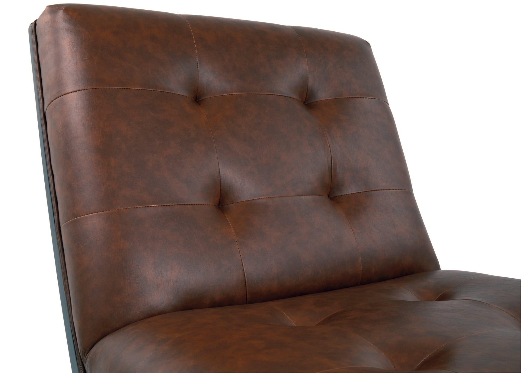 Close-up of tufted button details on Sidewinder Chair
