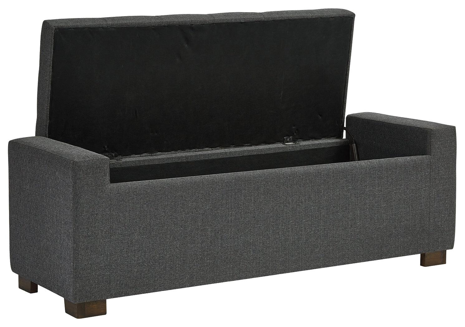 Open hinged seat revealing storage compartment