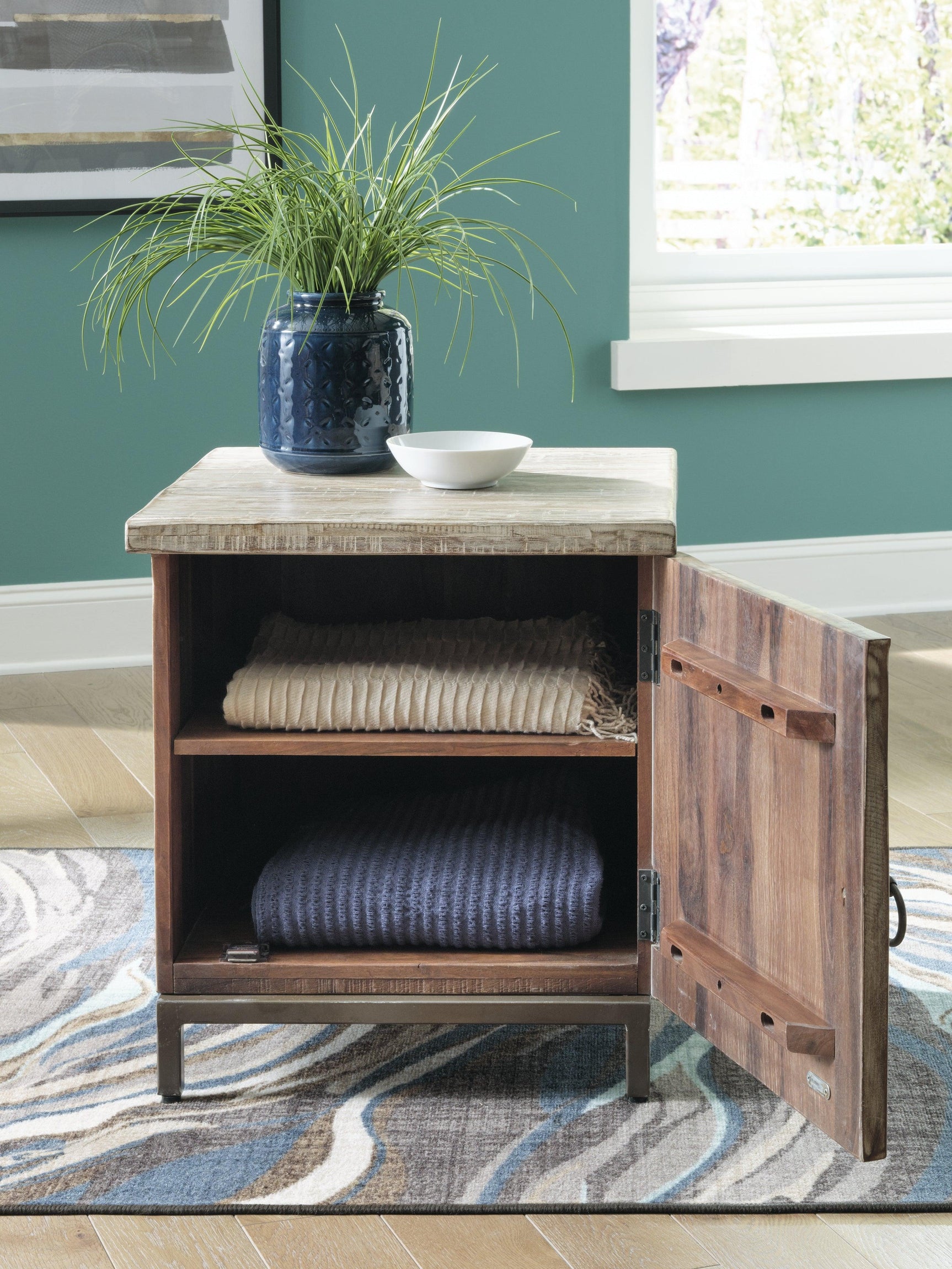 Laddford Accent Cabinet open door displaying inside shelf