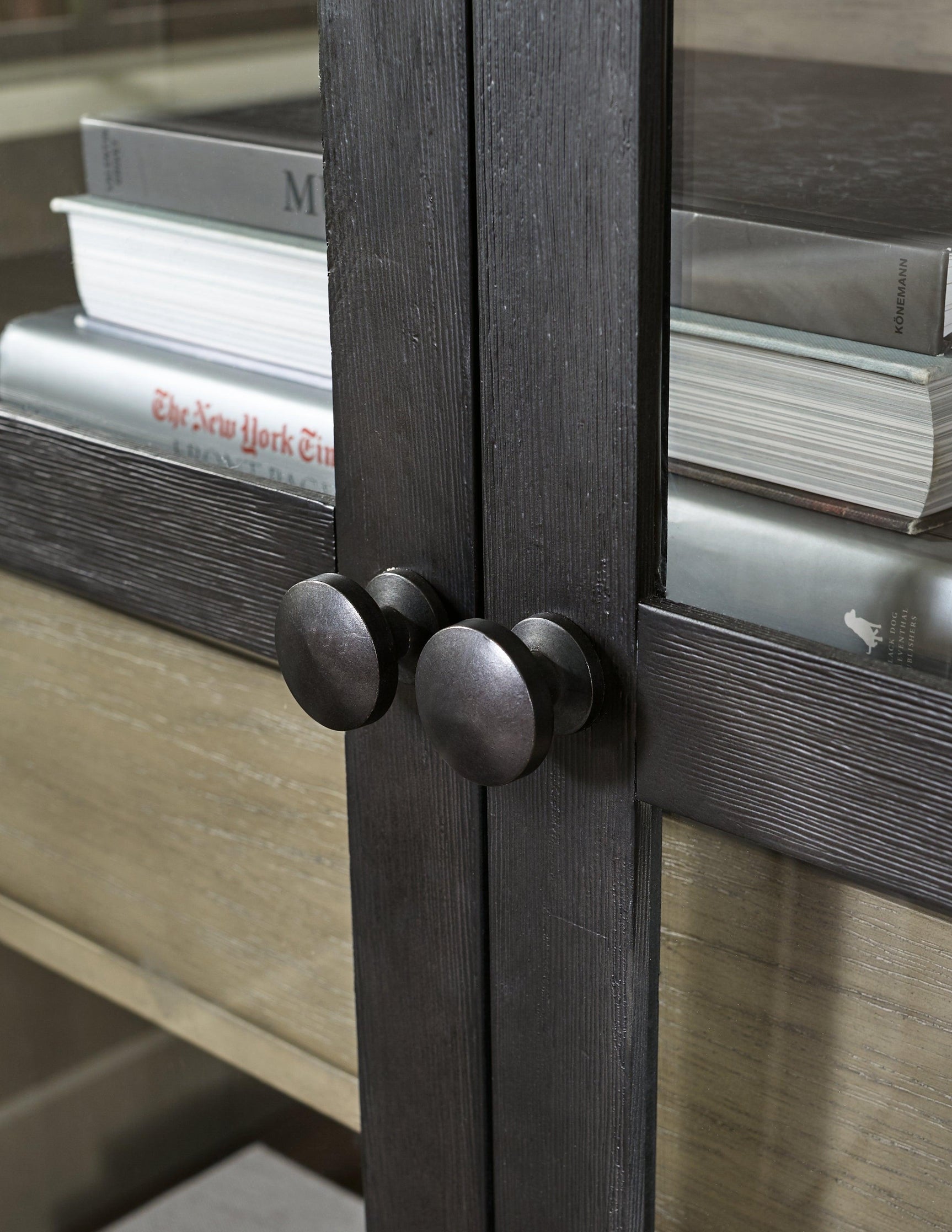 Lenston Accent Cabinet detail of metal black finish knobs