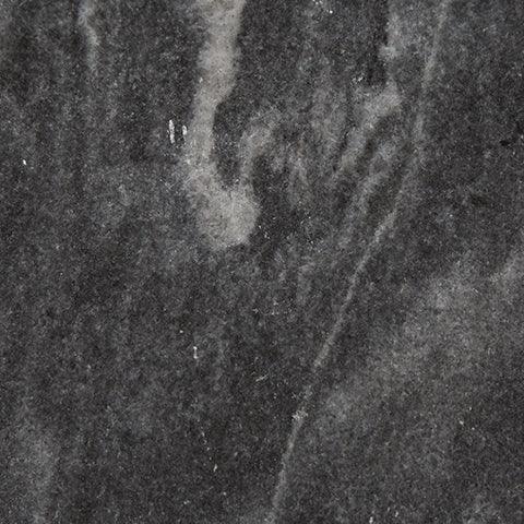 Top-down view of Caramont black and white marble round tabletop