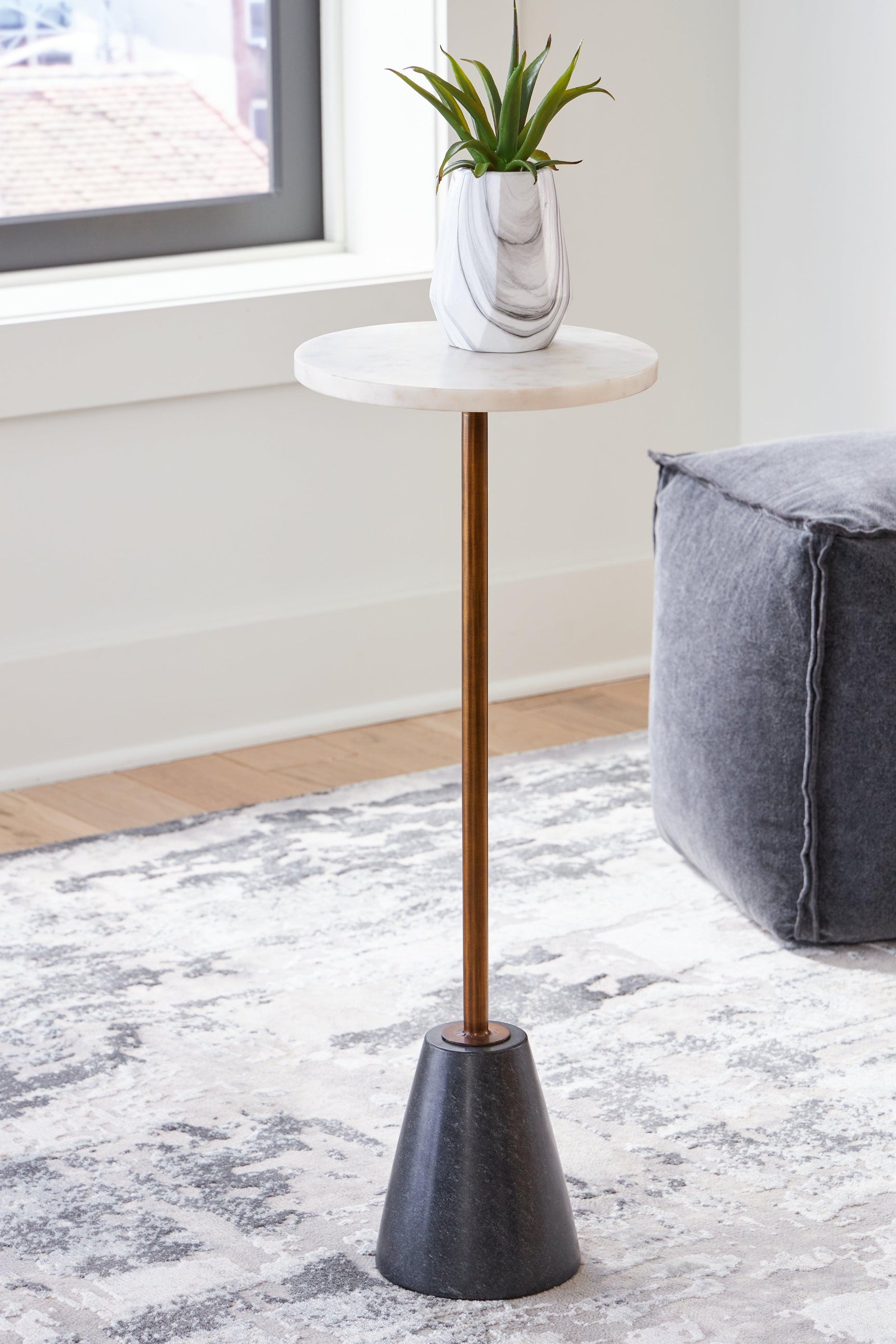 Caramont marble accent table showcasing contemporary styling