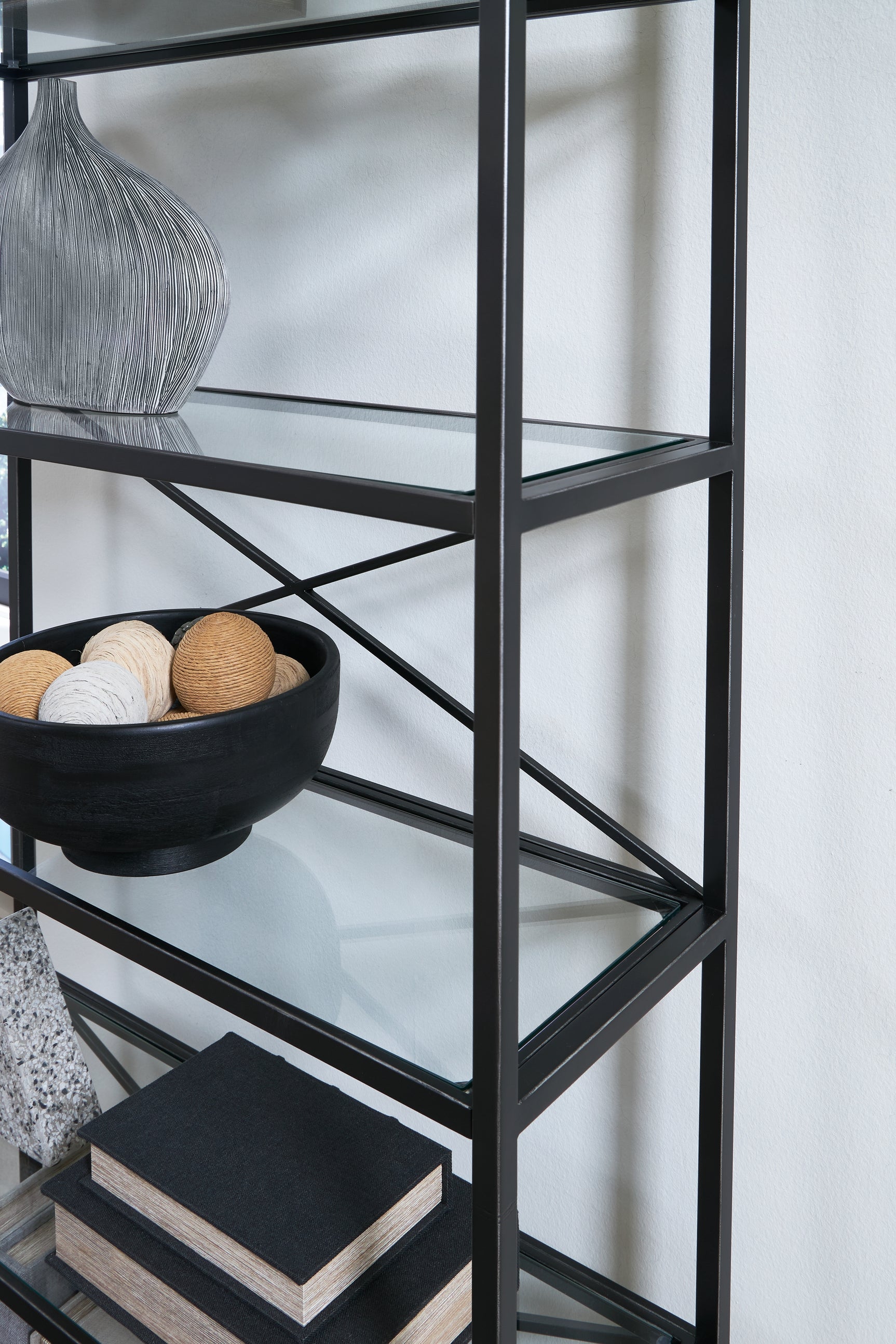 Dakerwell antique black metal frame and glass shelf detail