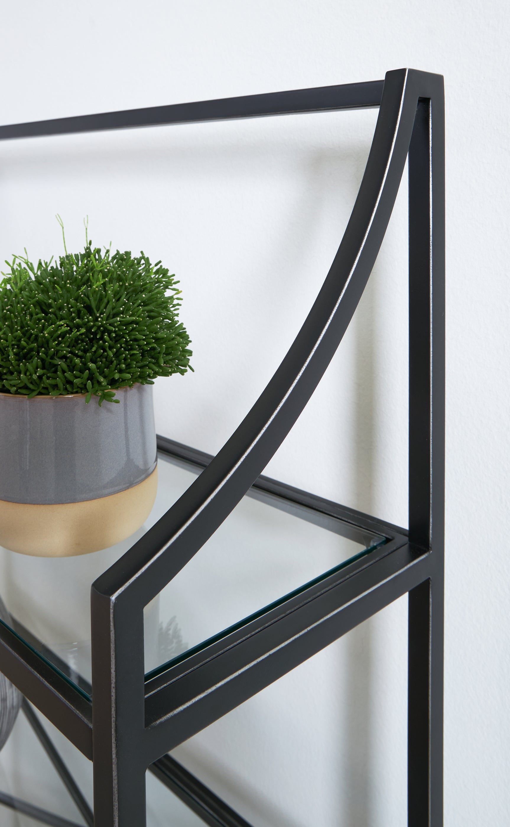 Antique black finish detail on Dakerwell bookcase