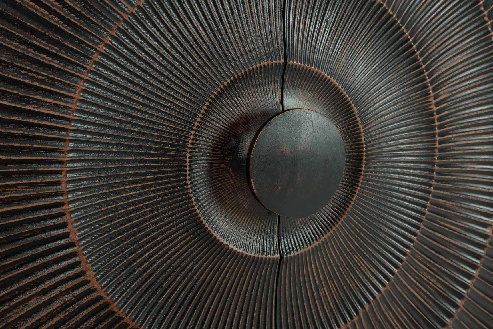 Close-up of distressed black wood finish