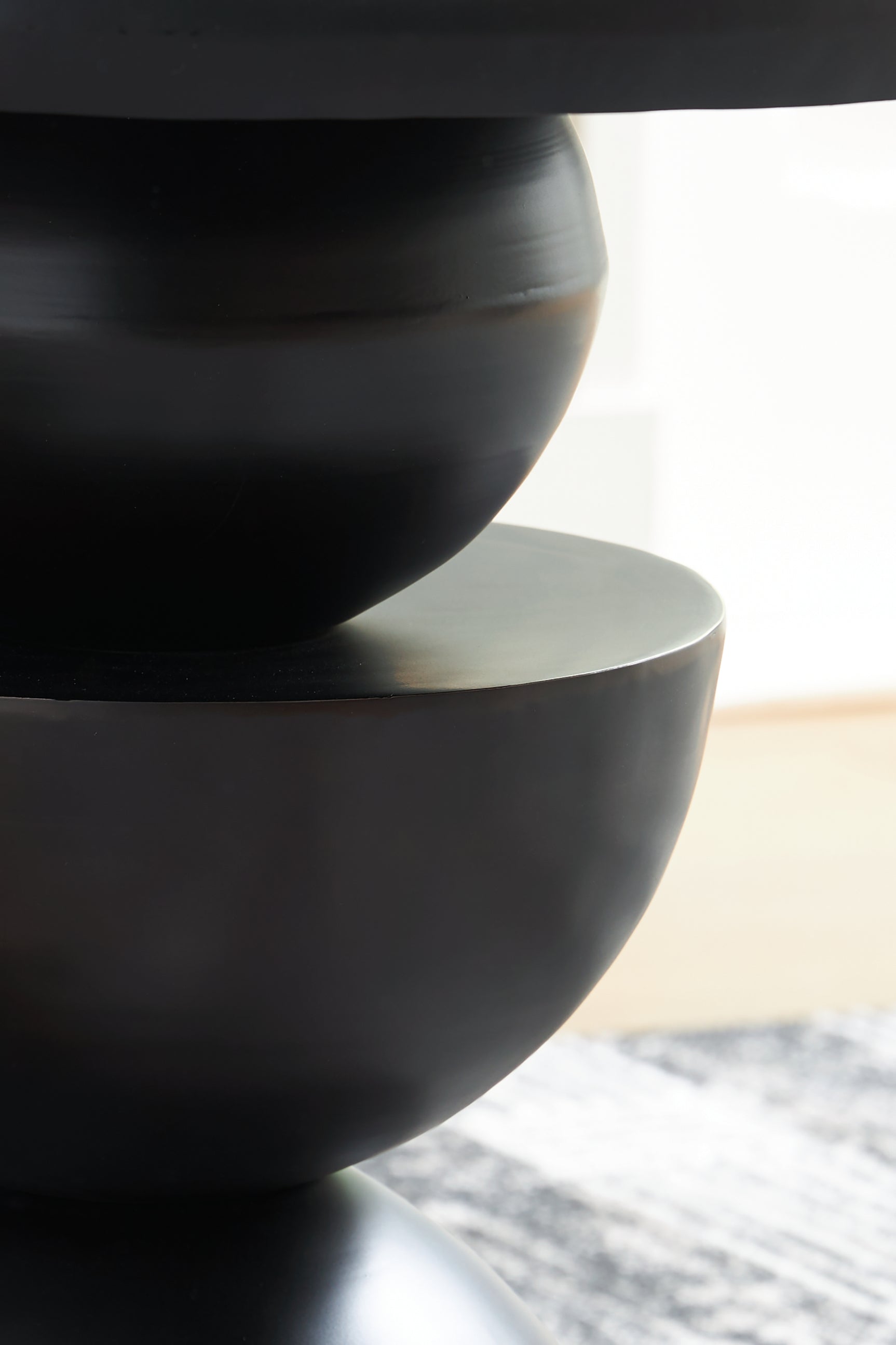Detail of geometric metal base of Kurtson Accent Table
