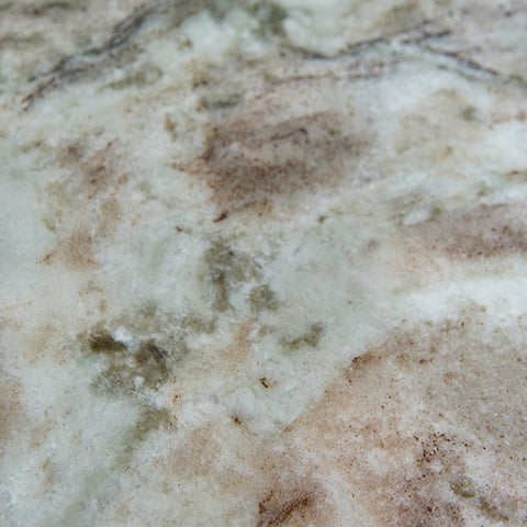 Marble top finish showing natural veining and color variation