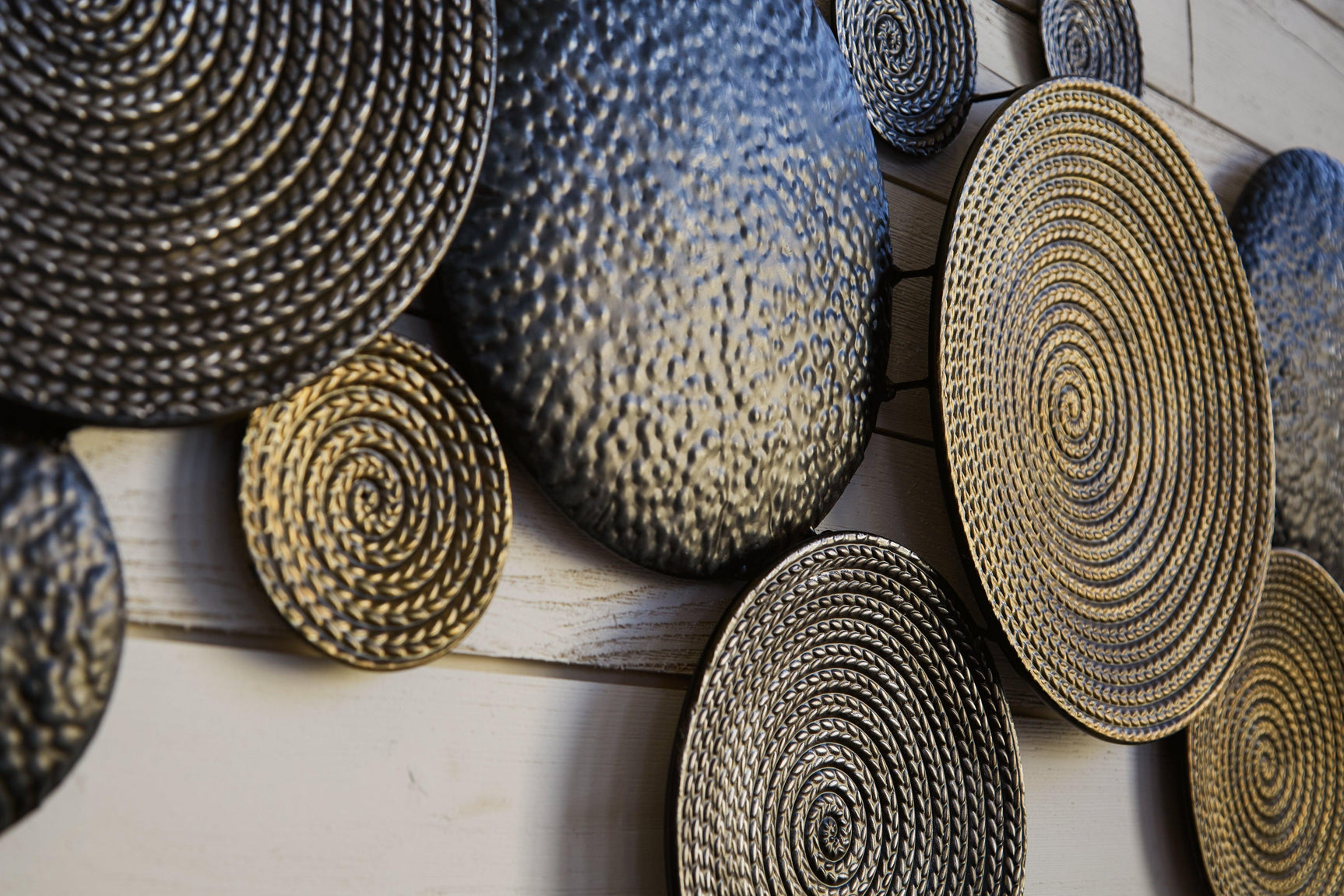 Close-up detail of Emsley Multi Wall Decor metal textures