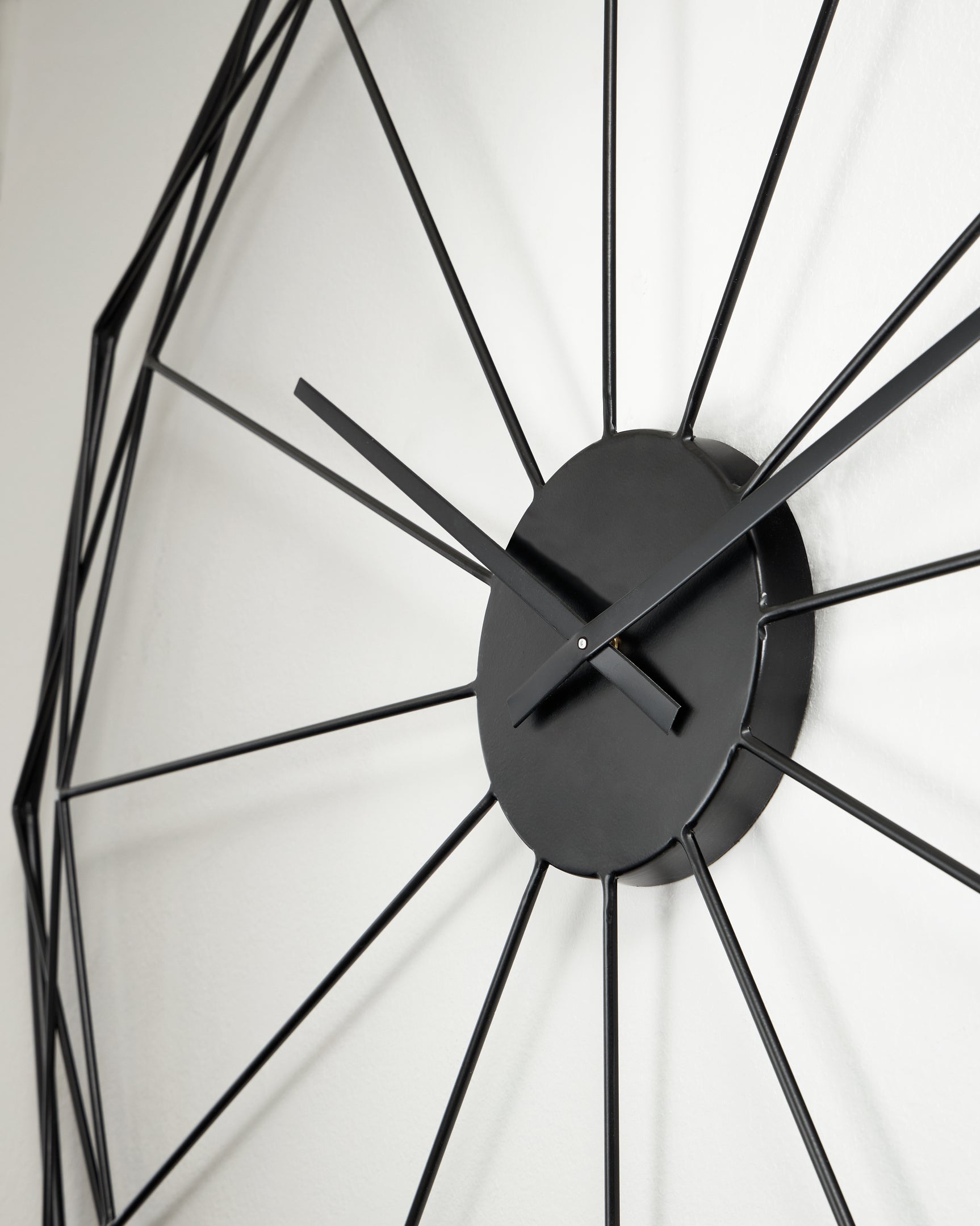 Detail close-up of Arkthorne wall clock black metal finish