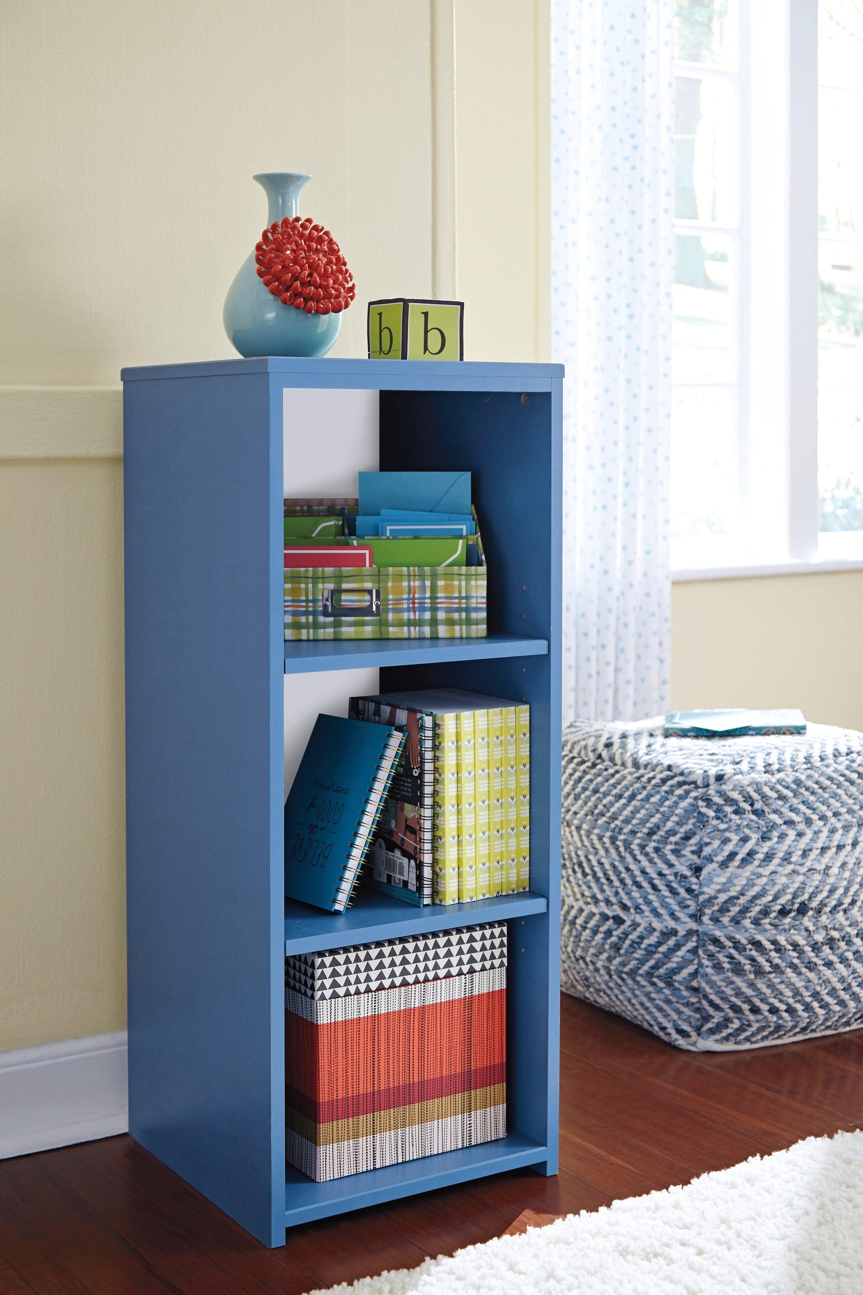 Chevron Blue Pouf styled in living room