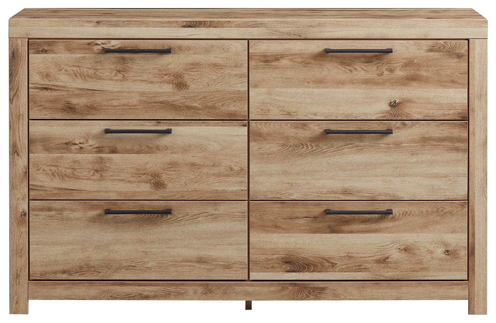 Close-up front view of Hyanna Tan Dresser showing wood grain finish