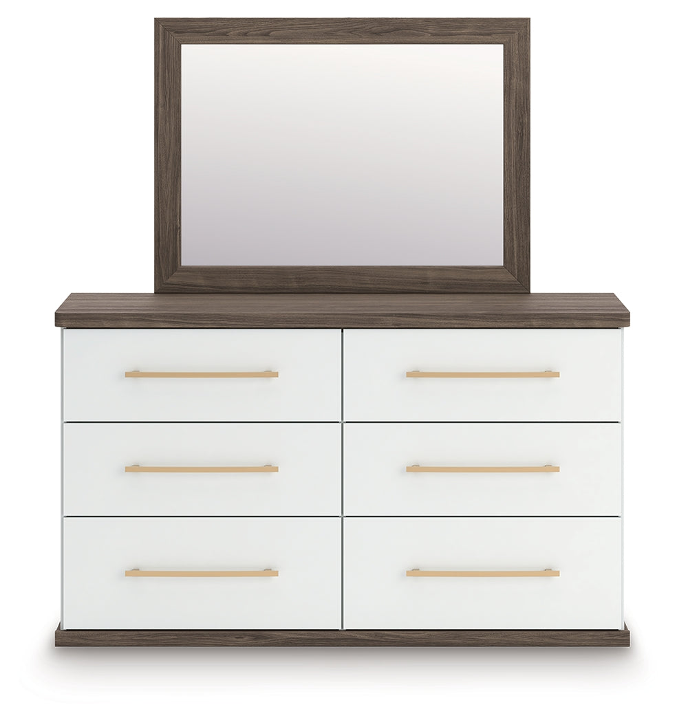 Straight-on view of dresser and mirror