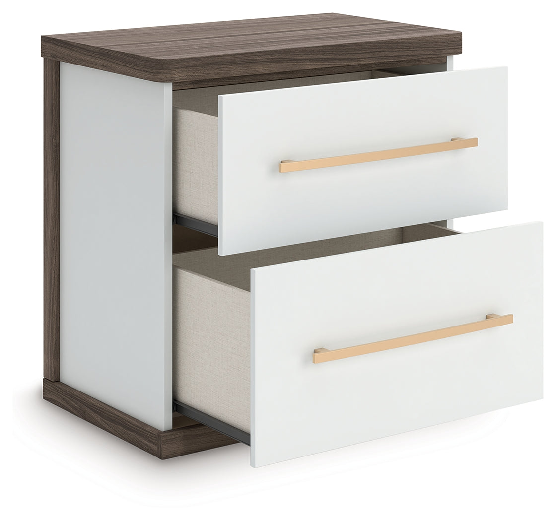 Open drawers of Kendanport Nightstand showing interior
