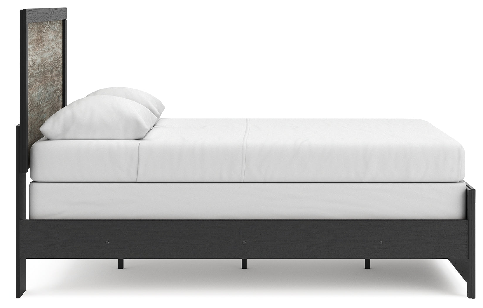 Side profile showing footboard and rails of Broachmyn Queen Panel Bed