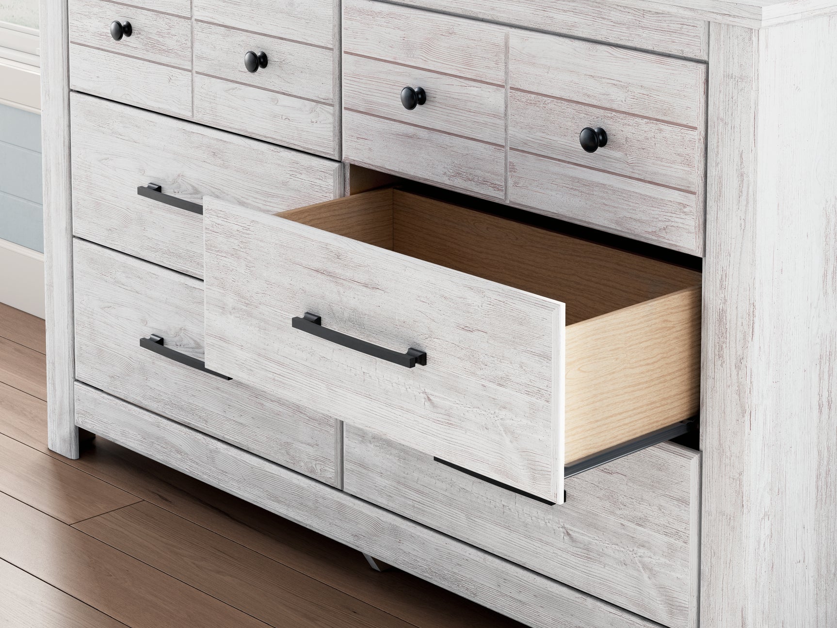 Close detail of Makidern Dresser drawer hardware