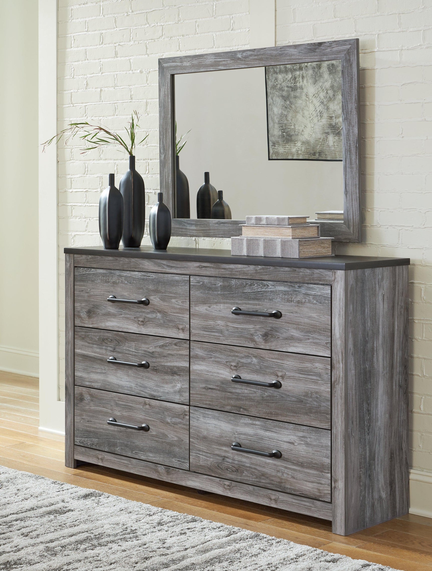 Close-up of large dark-hue handle on Bronyan dresser drawer