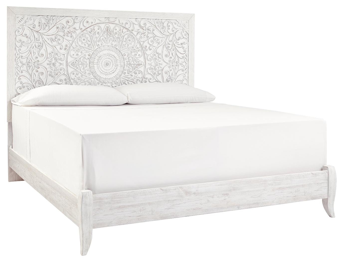 Paxberry Whitewash King Panel Bed angled side view showcasing footboard