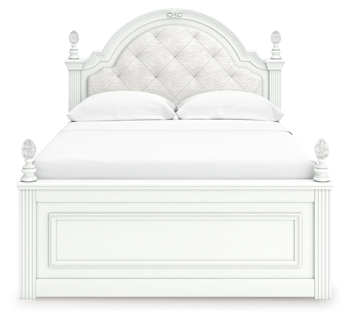 Close-up front view of Kozlani upholstered headboard with beading and ball tops