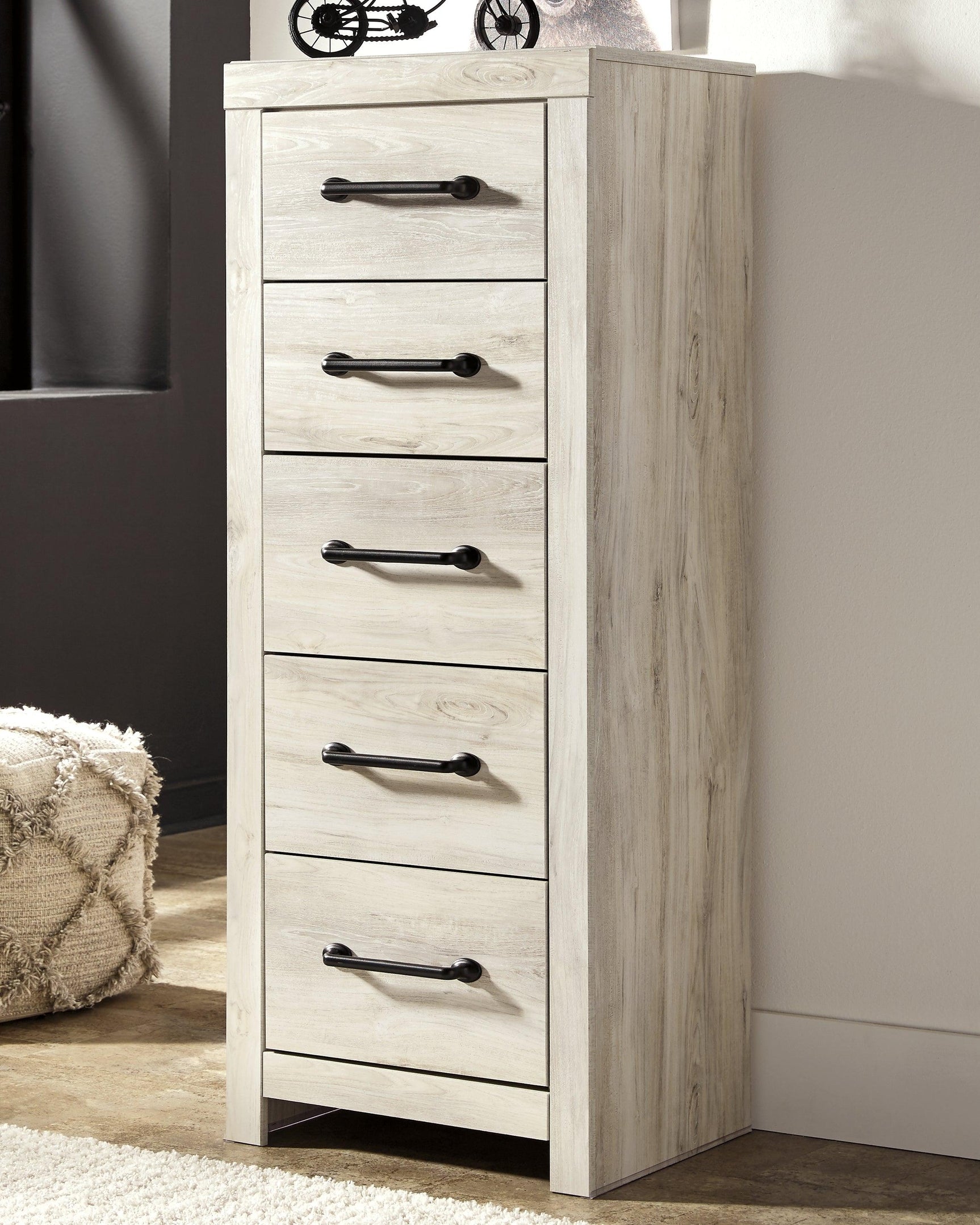 Cambeck whitewash narrow chest of drawers styled in bedroom