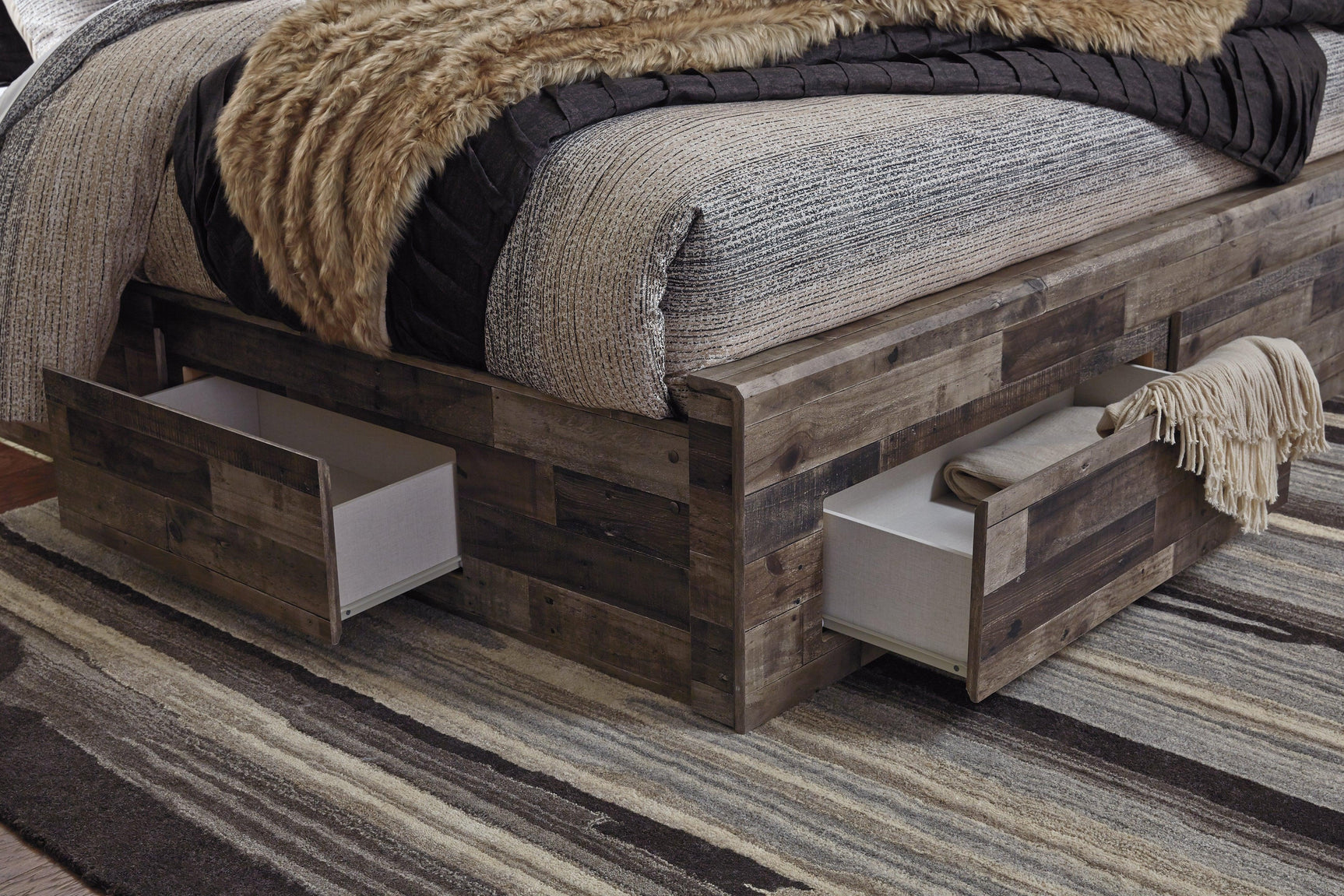 Under bed storage space of Derekson Queen Panel Bed