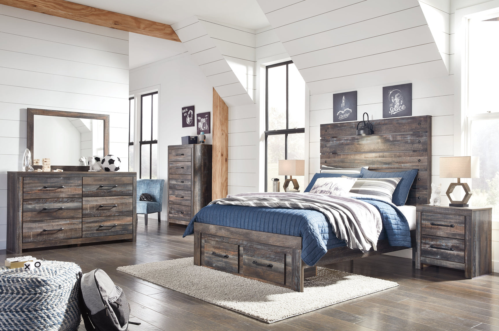 Side view of Drystan full panel bed with storage drawers open