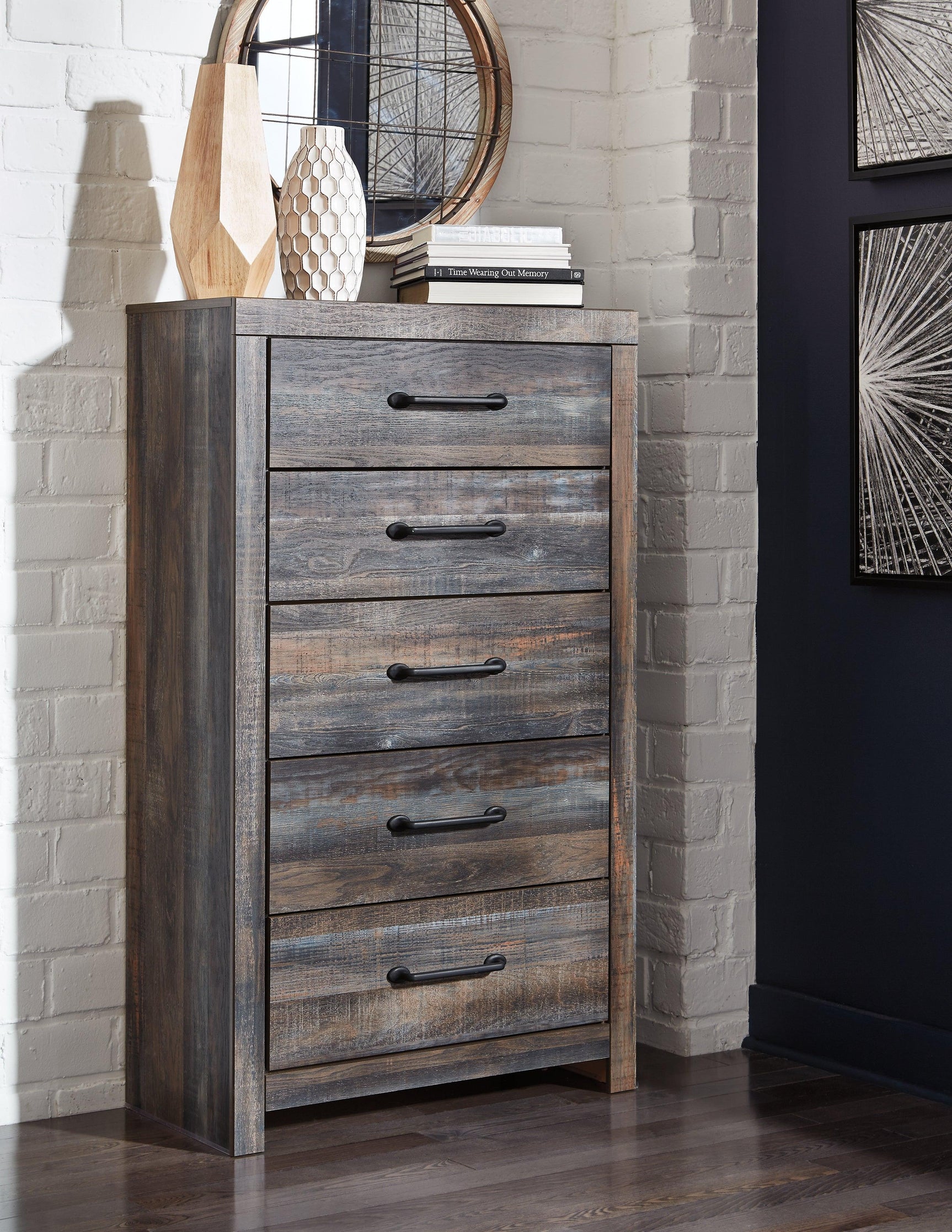 Drystan Multi Chest of Drawers angled front view with burnt orange and teal accents