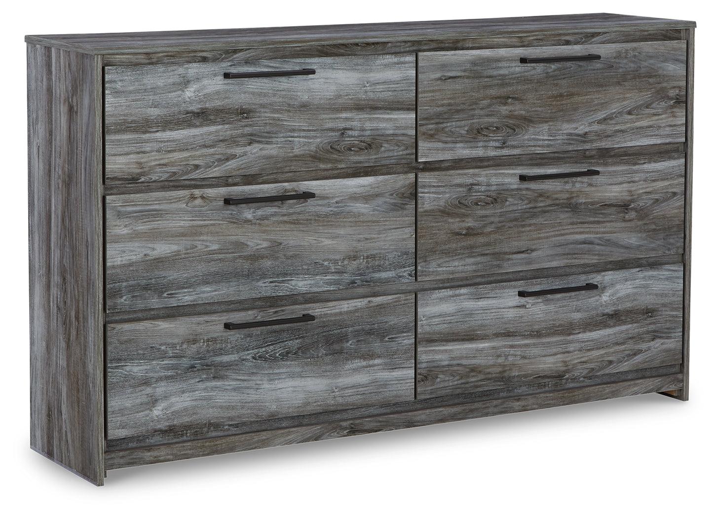 Baystorm mirror attached to dresser reflecting room