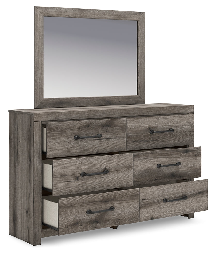 Graystorm dresser drawer open showing interior lined with faux linen