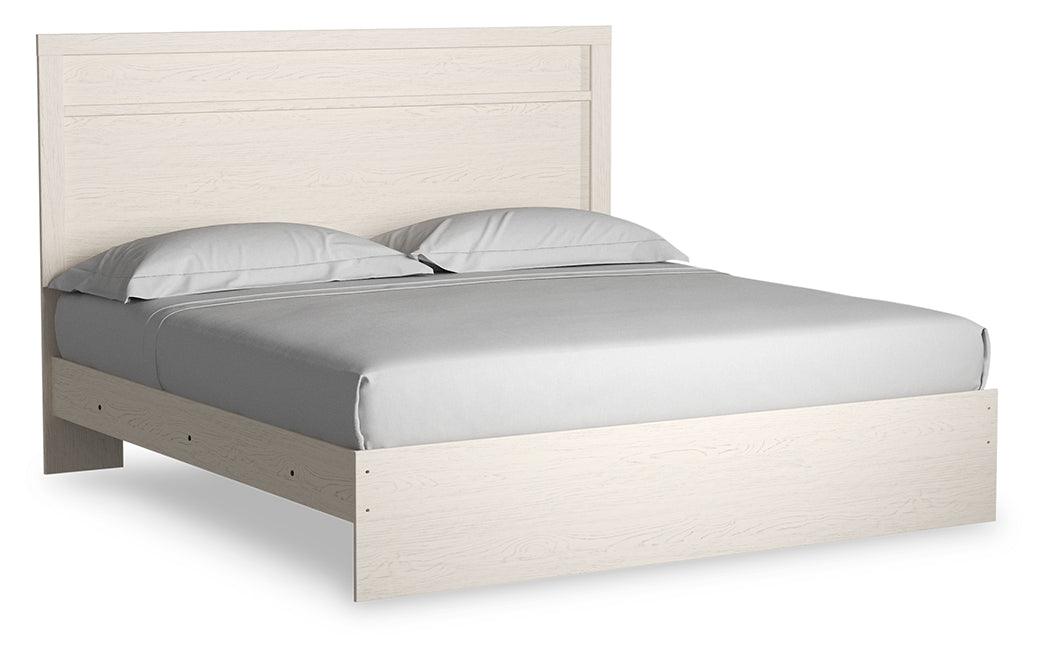 Stelsie White King Panel Bed - side angle highlighting white finish and panel details